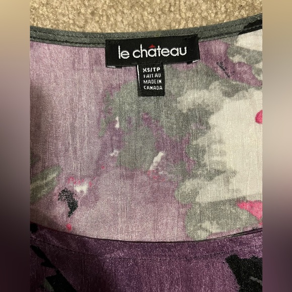 New multi print Tunic in size XS. Never worn once. - Picture 3 of 4